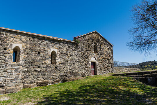 Osona, Spain - June 27, 2026: Ancient stone monastery.