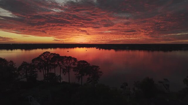 Stunning Aerial Drone View of a Vibrant Red Sunset Over Bear Lake in Altamonte Springs, Florida, USA.  January 2, 2026. 