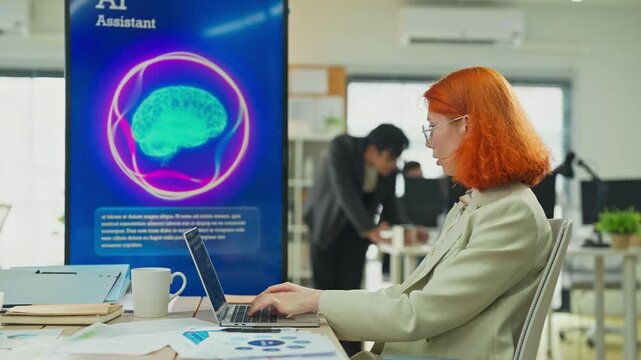 Caucasian female marketer using laptop and AI consultant on multiple screens to restructure business and marketing strategy in modern open office, digital transformation planning concept