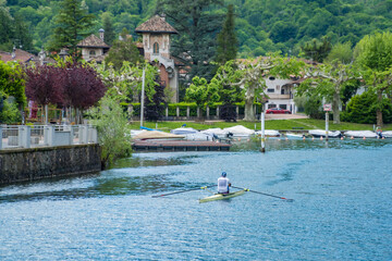 Caslano- Switzerland- 9 May 2026: rower kayak villa Lake Lugano Ticino © Oksana