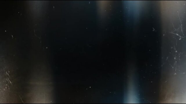 Dark cinematic texture with dust and film grain