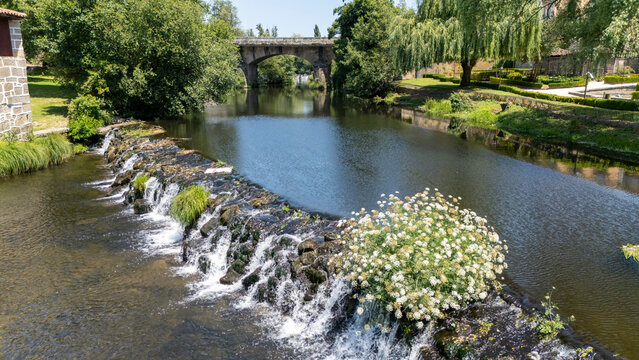Arnoia river weir and Roman bridge in Allariz