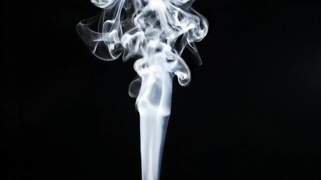 Closeup of swirling white smoke rising against a black background with abstract patterns
