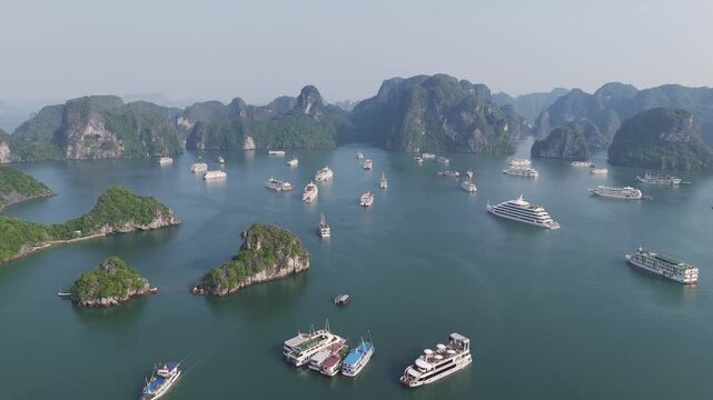 Aerial images of Ha Long Bay in Vietnam, cruise ships and mountains, 4k 30fps 1 inch sensor, drone images