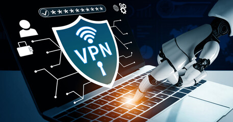 Fototapeta premium Robotic Hand Interacting with Laptop Displaying VPN Security Shield Interface in Digital Environment Haptic.