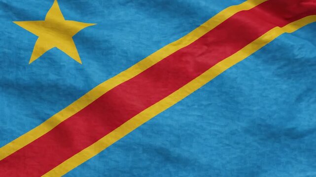 Closeup of the flag of the democratic republic of the congo with vibrant colors and fabric texture