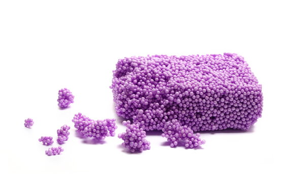 Pink sticky styrofoam balls, toy modelling foam shape, soft and lightweight, isolated on white background	