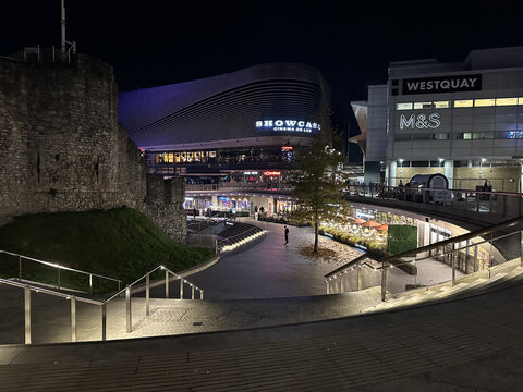 December 8, 2022 - SOUTHAMPTON, ENGLAND: View of central Southampton West Quay shopping centre and old town wall at night in Southampton, Hampshire in the UK