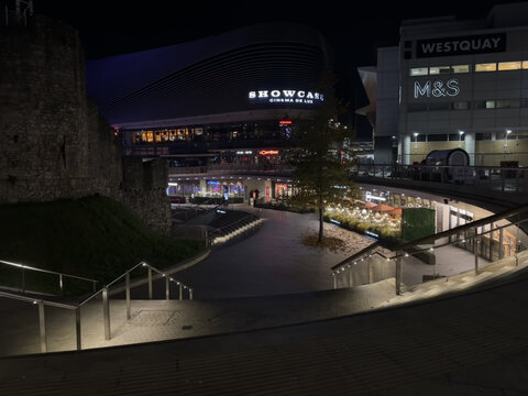 December 8, 2022 - SOUTHAMPTON, ENGLAND: View of central Southampton West Quay shopping centre and old town wall at night in Southampton, Hampshire in the UK