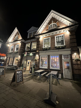 December 8, 2022 - SOUTHAMPTON, ENGLAND: Traditional British pub in Portswood, Southampton, UK. Exterior of MITRE pub at night.