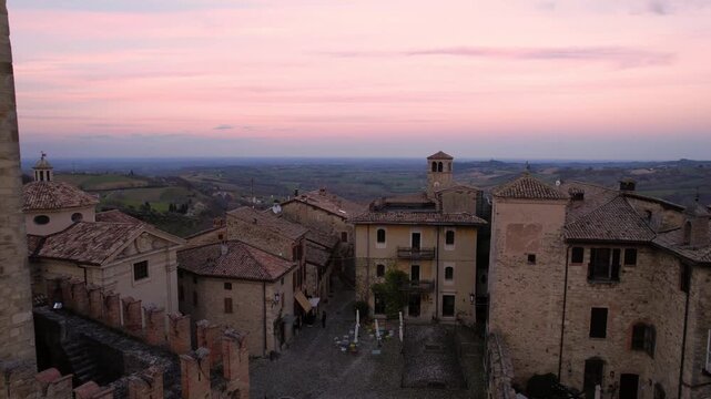 Drone view footage of Vigoleno Castle and medieval village in Vigoleno, Italy. Historic fortified hilltop destination in Emilia Romagna, ideal for tourism, travel, lifestyle and cultural vacation