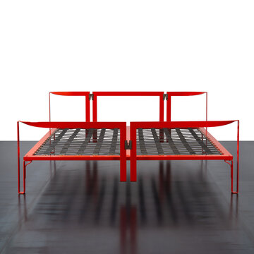Front view of double bed, featuring a red enamelled metal frame and a bed base with straps.