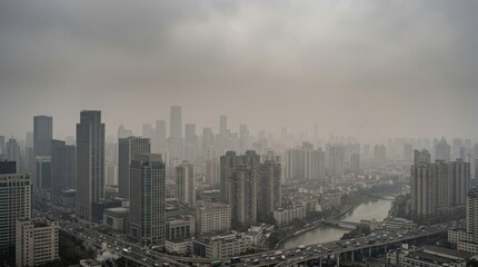 Fototapeta premium Cityscape View of Modern Urban Skyline with Skyscrapers and River Under Overcast Sky.