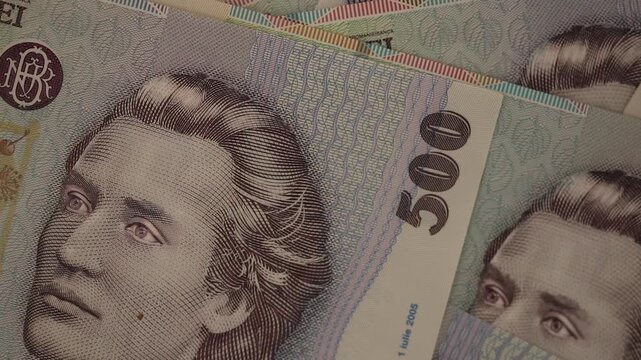 Romanian 500 LEI banknote close up video with Romanian national currency bills and finance concept