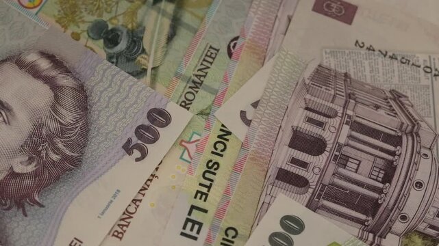 Romanian 500 LEI banknote close up video with Romanian national currency bills and finance concept