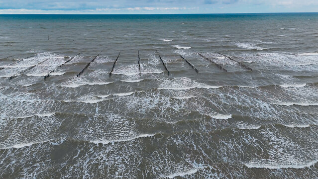 Aerial drone view of an oyster farm on Normandy coast of France.