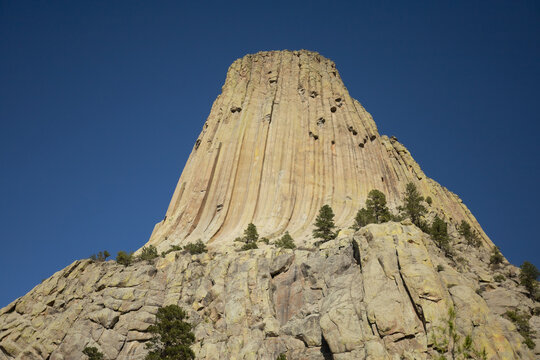 Devils Tower National Monument Against A Deep Blue Sky In Wyoming
