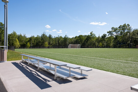 bleachers overlooking a soccer field