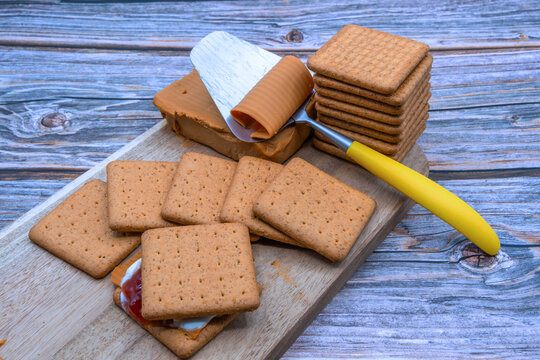 Crunchy, oatmeal, wheat, aroma, barley malt and flour Norwegian biscuit (Kornmo), layered with brunost (brown cheese), cream and fresh berry preserve, is a traditional S&aelig;tre G&aring;rd, Norway comfort food