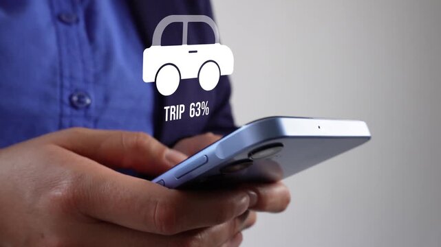 Businesswoman with smartphone in hand with a fill animation of a car's percentage counter and the word "Trip".