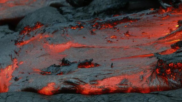 Close Up of Active Pahoehoe Lava Flow with Glowing Molten Volcanic Texture