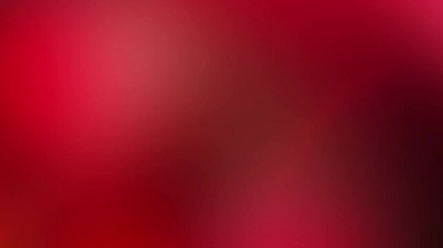 Smooth gradient motion loop blending intense crimson red and soft dark ruby glow effects. Perfect for elegant backdrop designs, theatrical displays, and creative overlays.