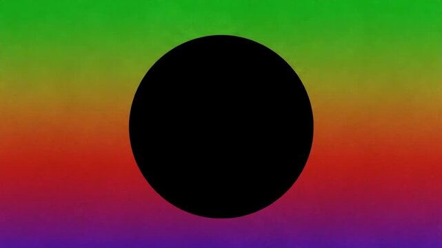 A solid black circle centered over a vibrant multicolored grainy background