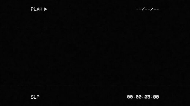Vintage Damaged VHS Tape with PLAY Text and Timecode on Screen. Analog TV Noise on Dark Background. 4K Retro Vintage Background Overlay for Screen Mode.