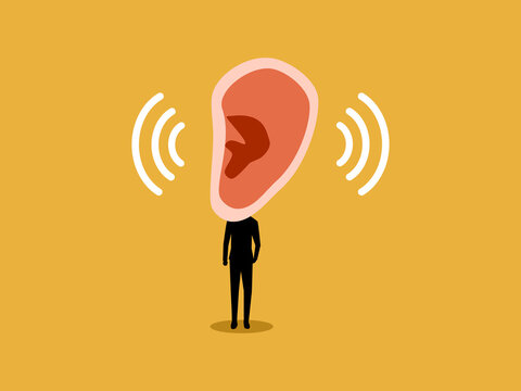 Businessman use their ears to listen to information and remain mindful during conversations or discussions