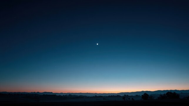 venus. The morning star visible above the horizon before sunrise in a dark blue sky. travel magazines, destination branding, designed for travel destination branding, used by web designers.