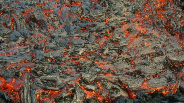 Flowing Lava from Active Volcanic Eruption with Glowing Molten Rock Landscape