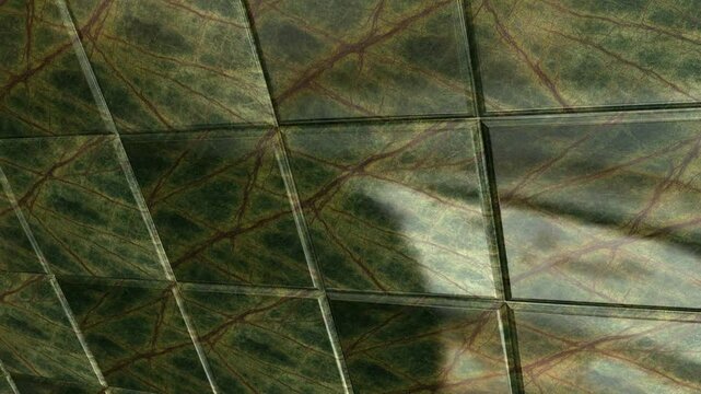 Fluid Camera Motion Over Rainforest Green Marble Tiles Highlighting Exotic Natural Veins and Glossy Glare Effect for Luxury Interior Background