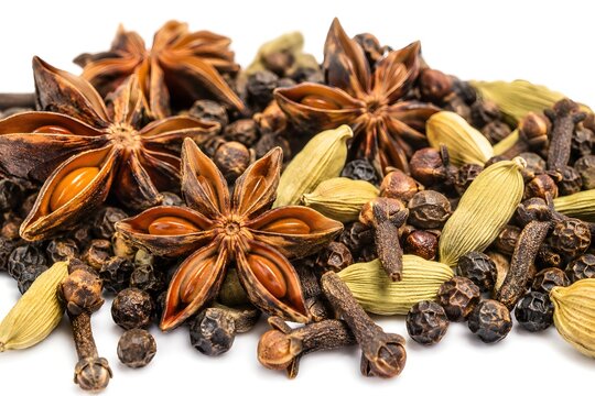Macro Close Up of Assorted Spices Showing Rich Texture on White Background