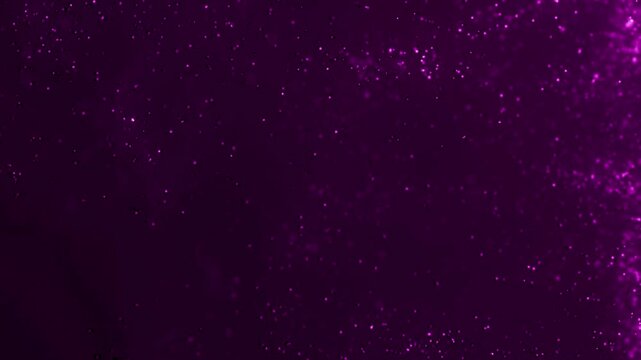 Falling purple sparkling background on dark 4k video
