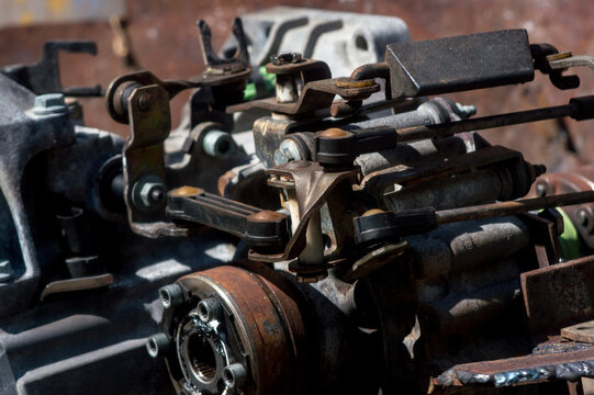old gear shift box from a front-wheel drive car installing cables and shifting gears disassembly for repair
