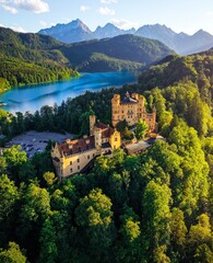 Obraz premium The beautiful Hohenschwangau Castle, situated on the shores of the picturesque Alpine lake Alpsee