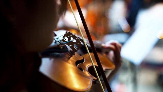 Cinematic Close up musician playing the violin in rehearsal studio
