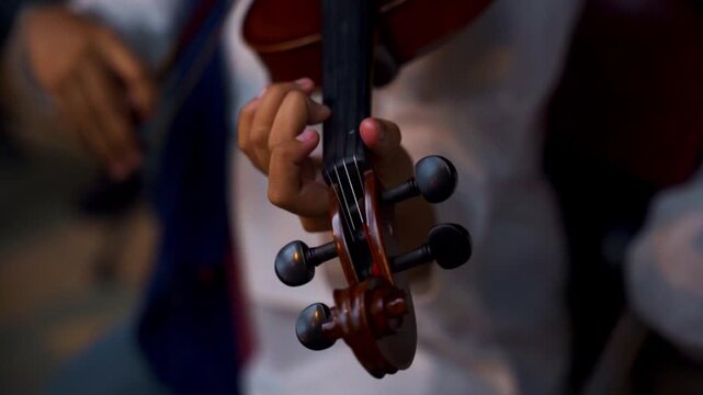 Cinematic Close up musician playing the violin in rehearsal studio