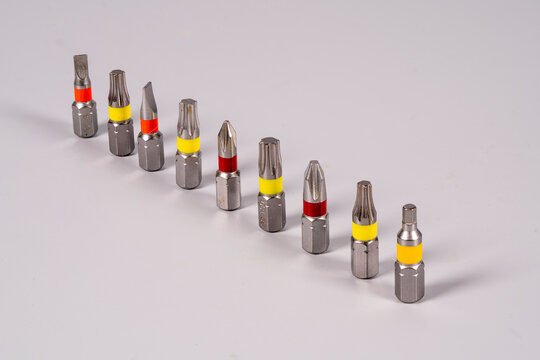 Different types of screwdriver bits in a row for various uses