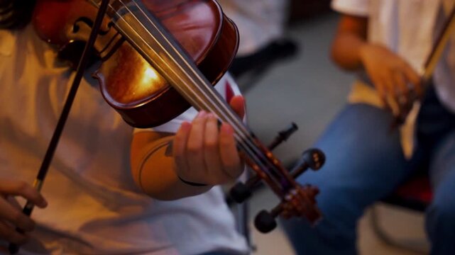 Cinematic Close up musician playing the violin in rehearsal studio