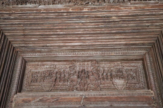 Intricately Carved Wooden Ceiling Panel Displaying Traditional Artisan Craftsmanship Beautifully Today
