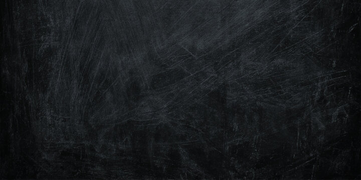 Dark scratched blackboard texture background with white chalk marks for writing or drawing
