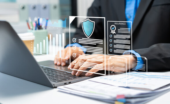 Businessman review digital insurance policy documents on laptop cybersecurity protection, risk management, compliance verification, data security, financial planning, corporate insurance solutions.
