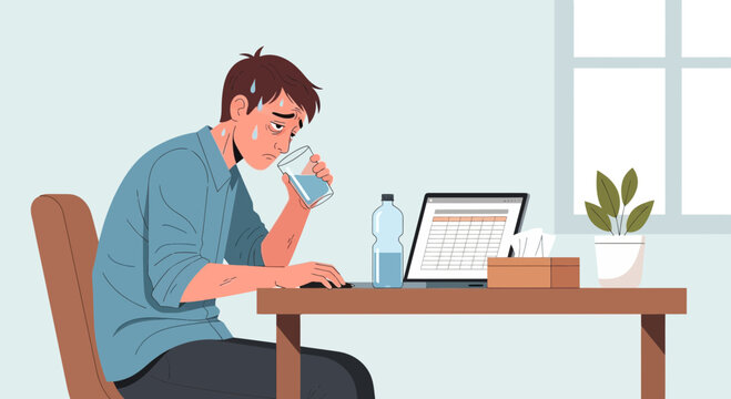 Stressed Worker Drinks Water At Desk While Working on Laptop to Cool Down and Refocus