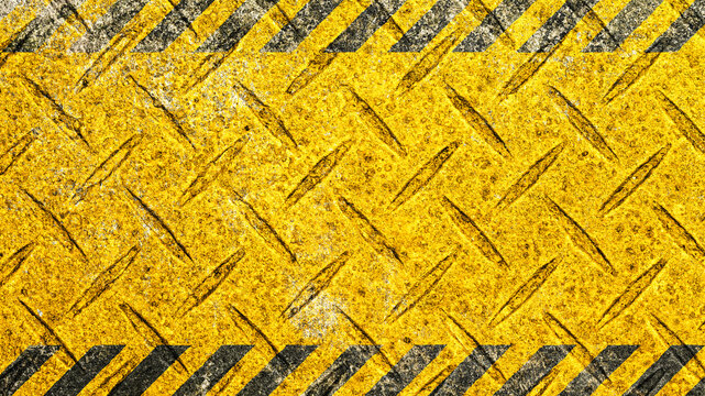 Yellow hazard diamond plate metal background with black caution stripes, grunge texture, and empty copy space. Useful for safety, industrial, construction, banner, and poster design.
