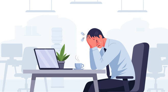 Stressed Businessman Overwhelmed At His Desk Due To Work Pressure Problems