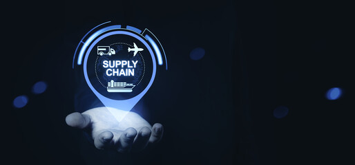 Digital supply chain icon hovering above an open hand with glowing transport symbols and a...