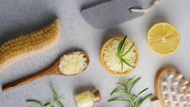 Bath salt with lemon and rosemary on a neutral background