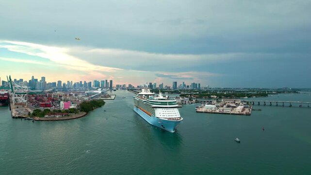 June 8, 2024 - Miami Beach, Florida: Aerial view Cruise ship Freedom of the seas sailing next to Miami South Beach. Cruise liner Freedom of the seas sailing from Miami Miami harbor. Cruiseship Freedom