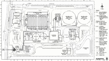 Fototapeta premium The architectural blueprint showcases a detailed industrial facility layout with various structures and infrastructure.
